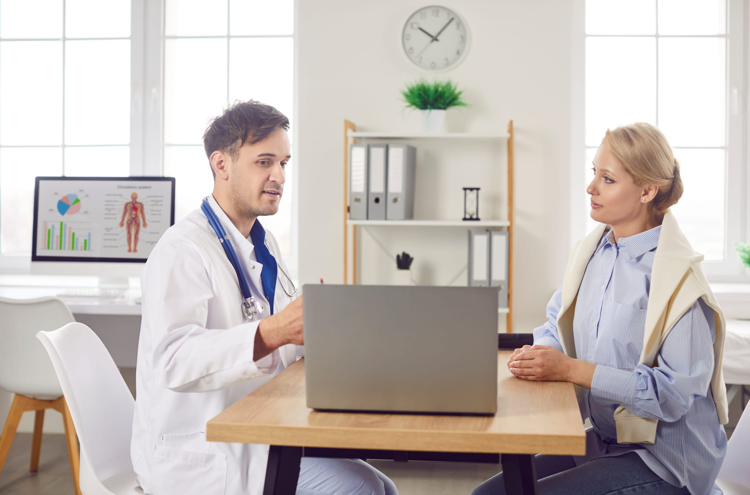 Doctor consulting his patient